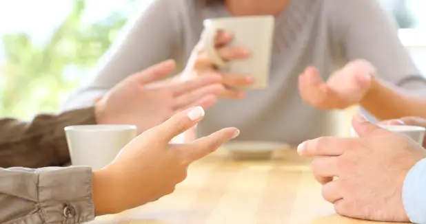 picture of people's hands in a divorce decision mediation