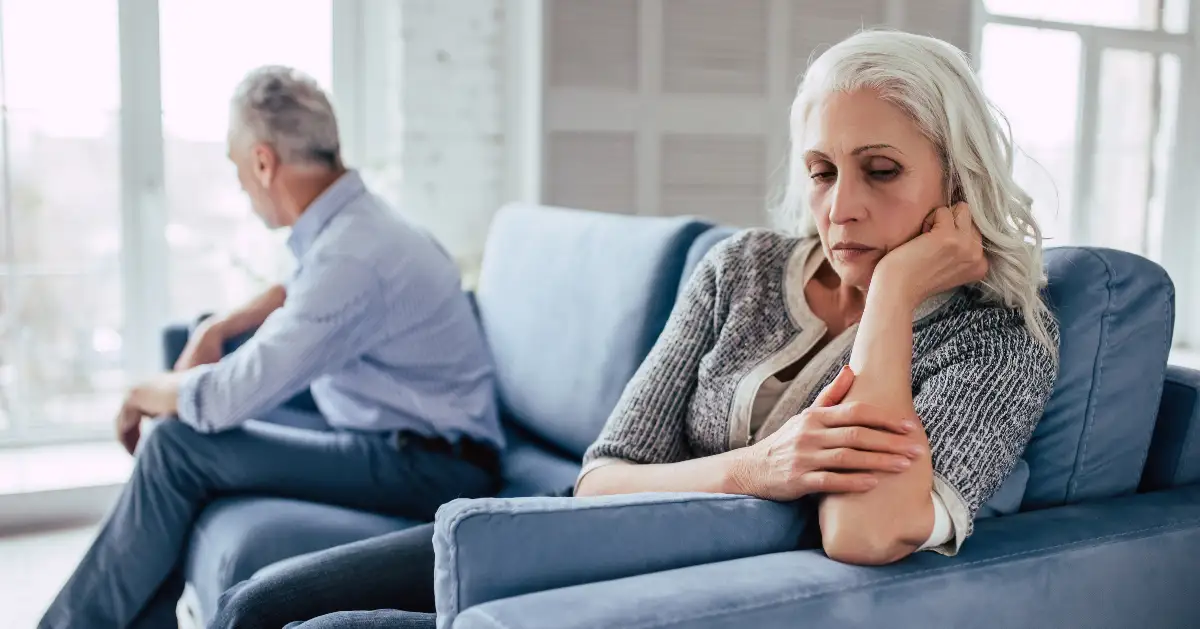 older couple on couch after taking divorce quiz