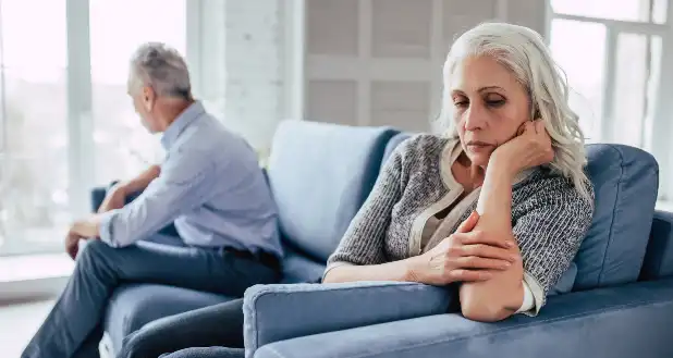 Older couple on couch after taking signs you need a divorce quiz